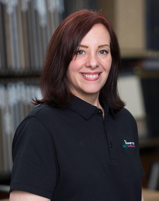 A woman with dark red brown hair